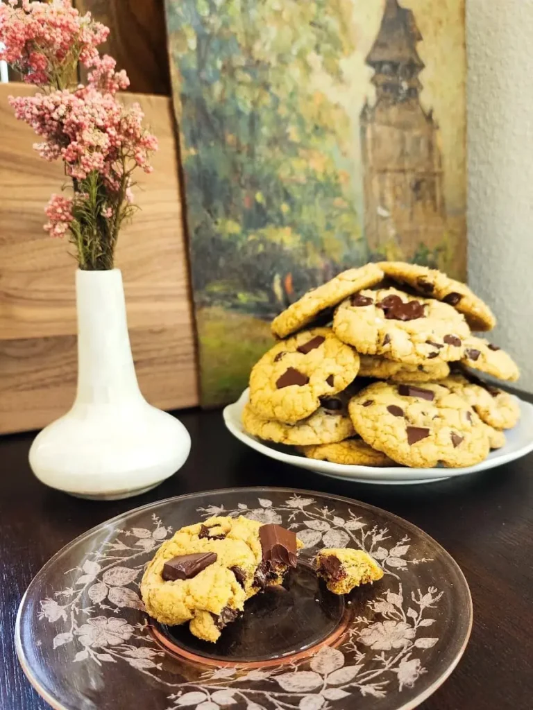 A plate piled high with gluten and dairy free chocolate chip cookies