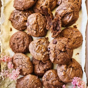 A pile of of chocolate peanut butter cookies