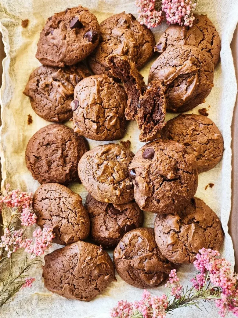 A pile of of chocolate peanut butter cookies