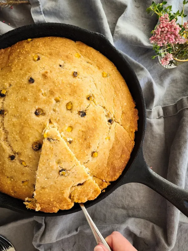 Gluten free cornbread in a cast iron skillet